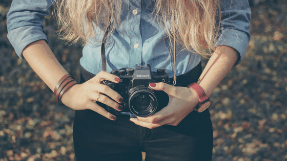 woman holding camera